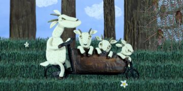 Knetfiguren einer Ziegenfamilie auf einem Lastenrad aus dem Film im Spatzenkino