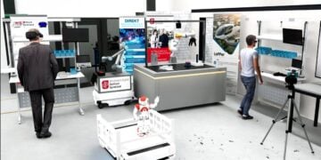 Virtuelle Nachbildung einer Fabrikhalle mit Transportrobotern an der BTU