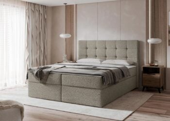 Beiges Boxspringbett mit Bouclé-Bezug, gestepptem Kopfteil und Bettkasten im Schlafzimmer