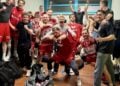 Die Handballer des LHC Cottbus jubeln in der Kabine nach dem Sieg beim BFC Preussen